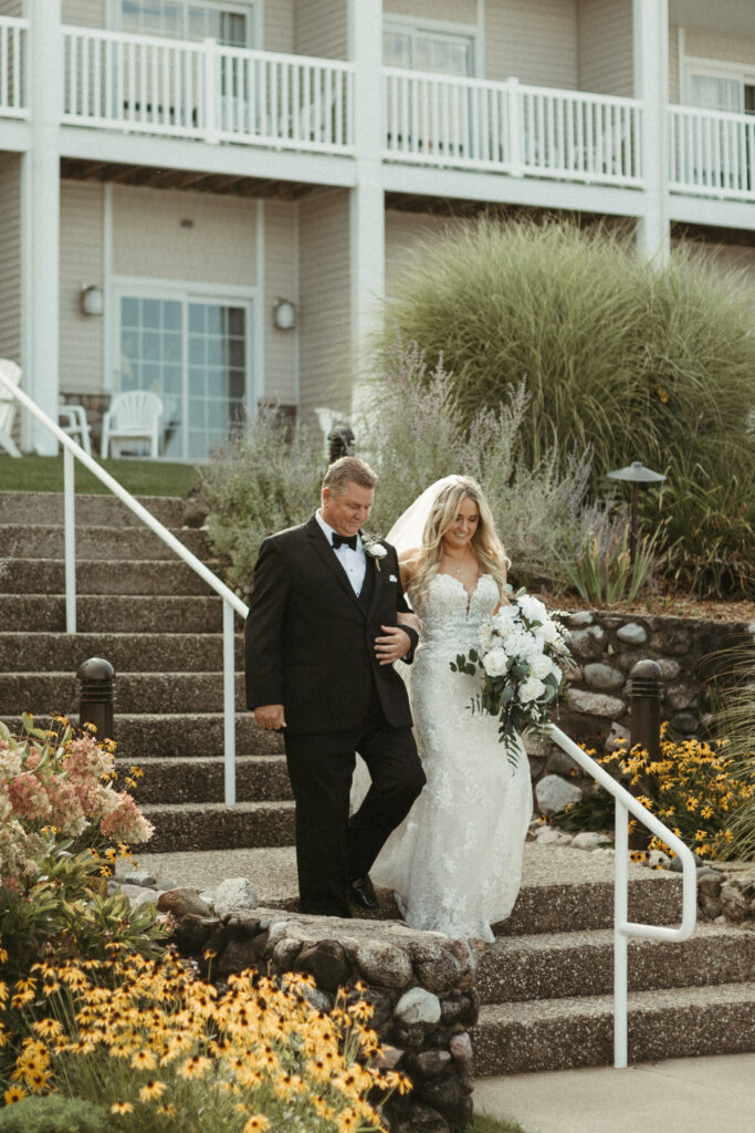 Wedding Ceremony Photos at Bay Pointe Inn Lakefront Pavilion in Shelbyville Michigan