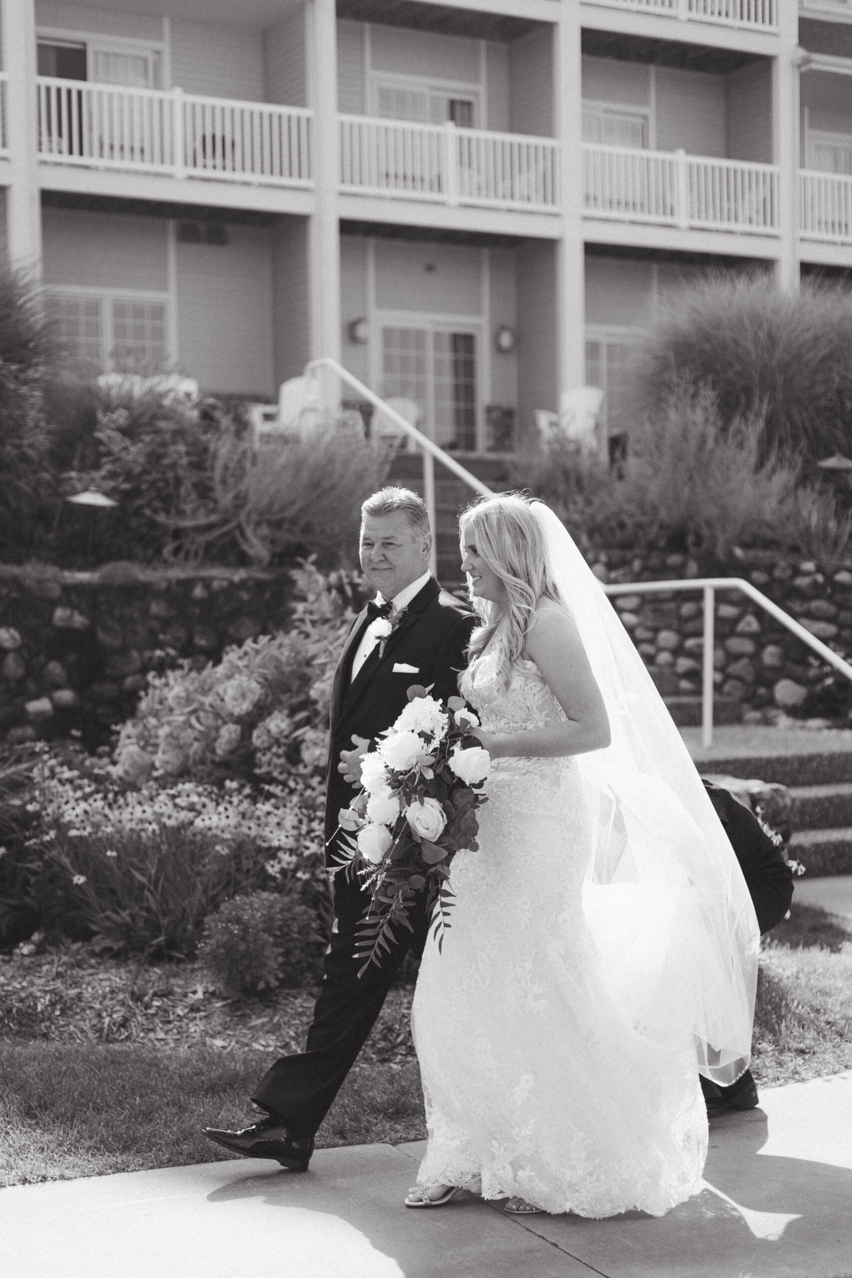 Wedding Ceremony Photos at Bay Pointe Inn Lakefront Pavilion in Shelbyville Michigan