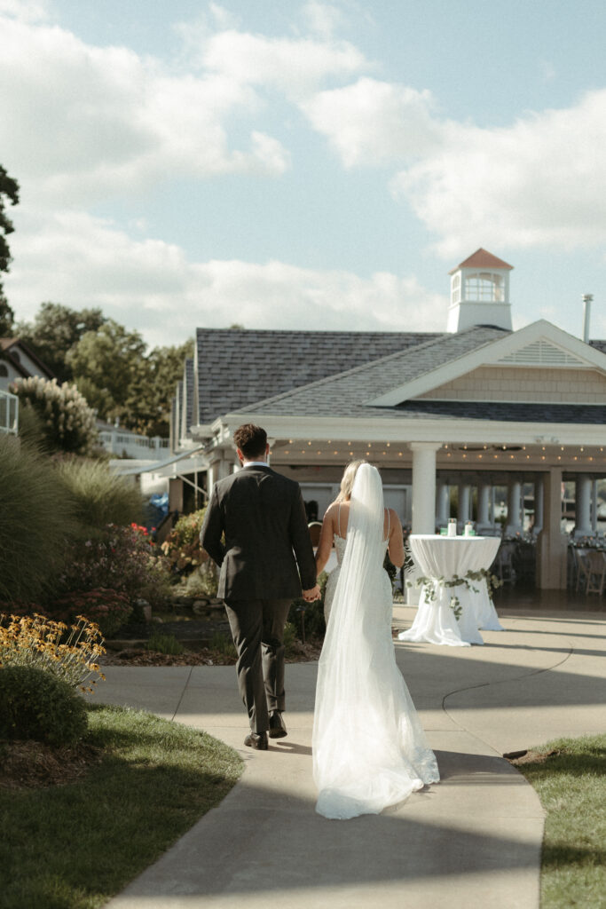 Wedding Ceremony Photos at Bay Pointe Inn Lakefront Pavilion in Shelbyville Michigan