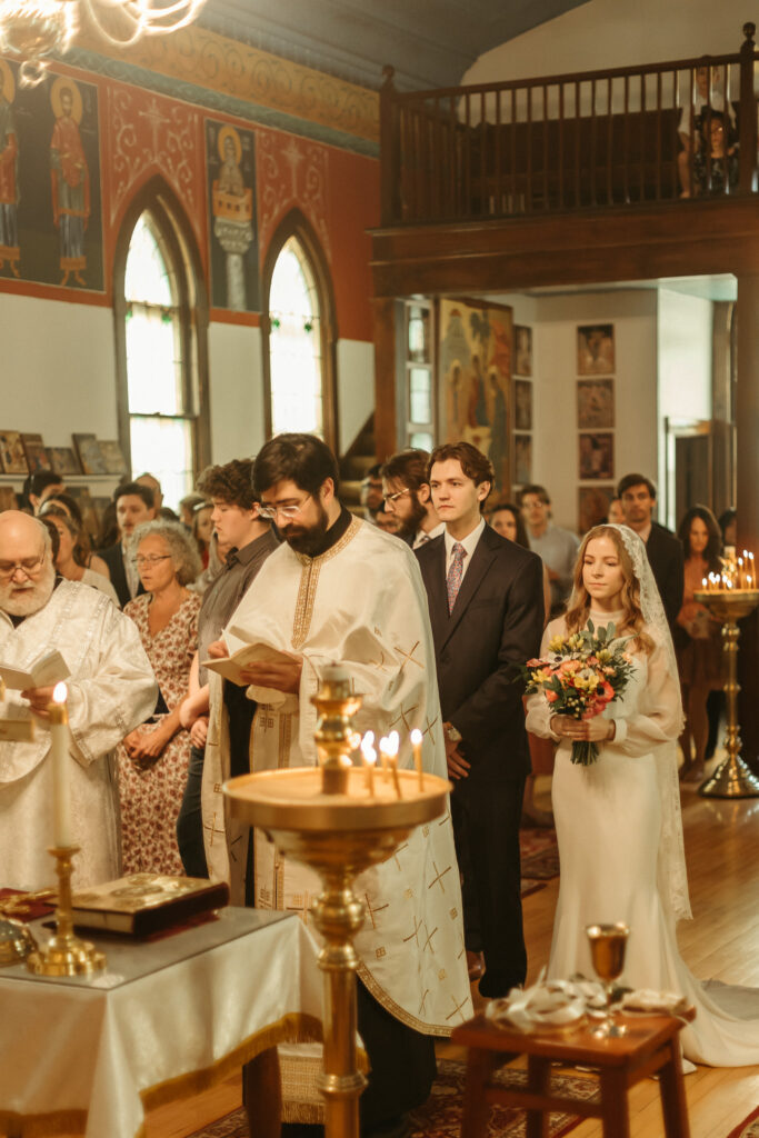 The Candles and Hand Holding ceremony of an Orthodox Christian Wedding in Michigan