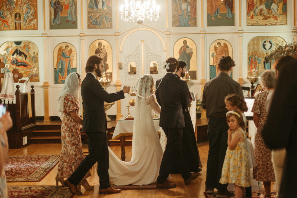 Circling the table ceremony of an Orthodox Christian Wedding in Michigan