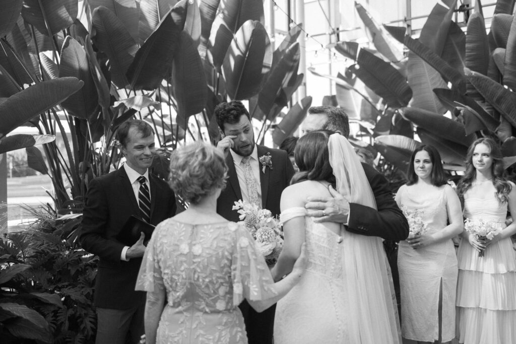 Wedding Ceremony at a greenhouse wedding venue in Michigan