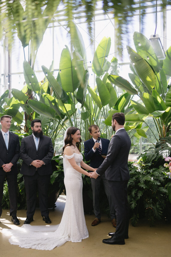 Wedding Ceremony at a greenhouse wedding venue in Michigan