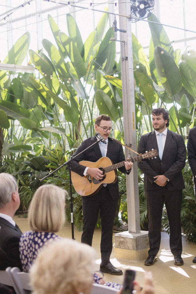 Wedding Ceremony at a greenhouse wedding venue in Michigan