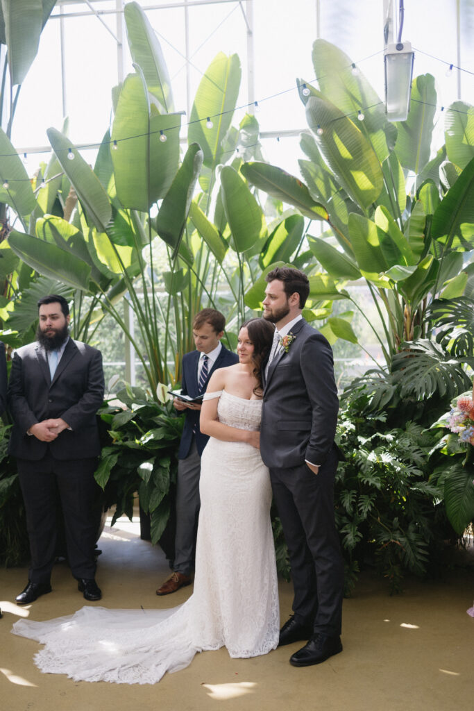 Wedding Ceremony at a greenhouse wedding venue in Michigan