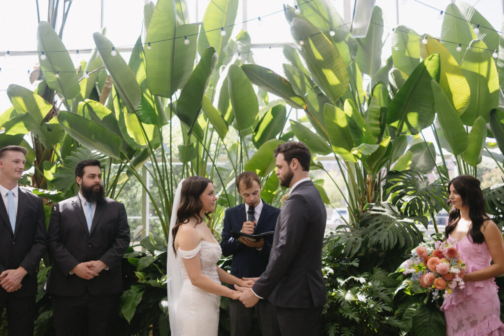 Wedding Ceremony at a greenhouse wedding venue in Michigan