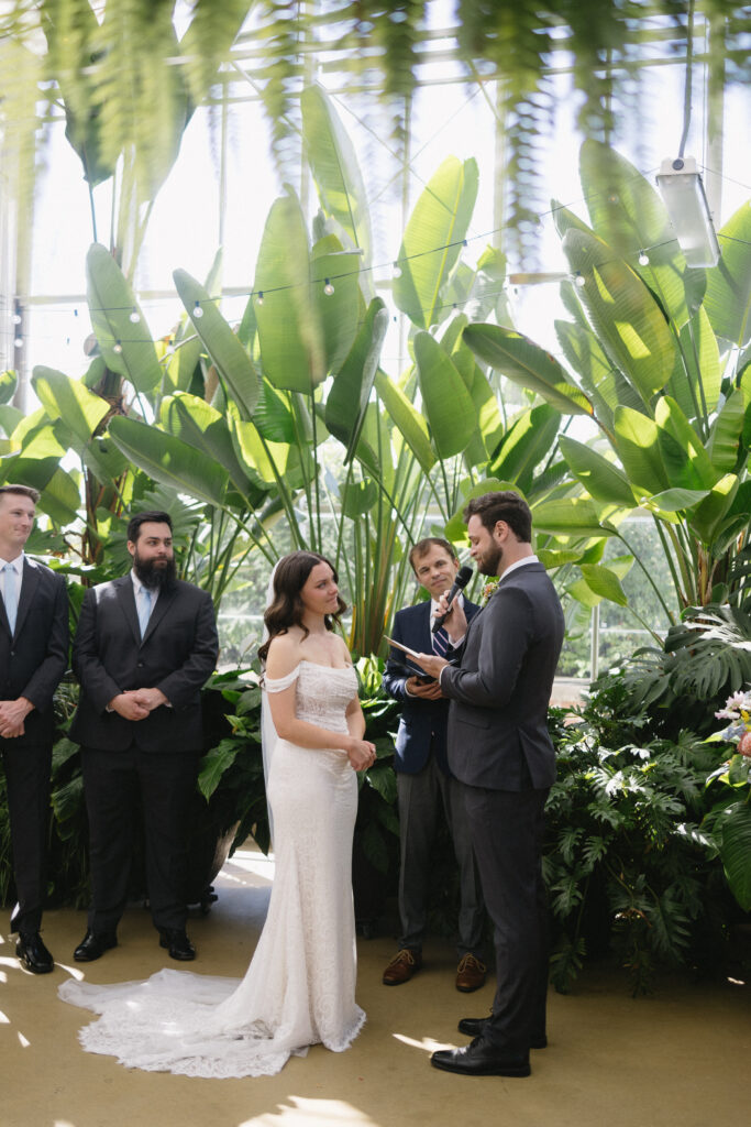 Wedding Ceremony at a greenhouse wedding venue in Michigan