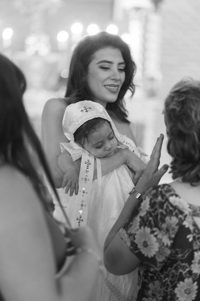 Candid family moments during baptism at Sts. Peter and Paul Syriac Orthodox Church