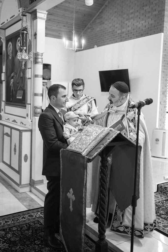 Candid family moments during baptism at Sts. Peter and Paul Syriac Orthodox Church