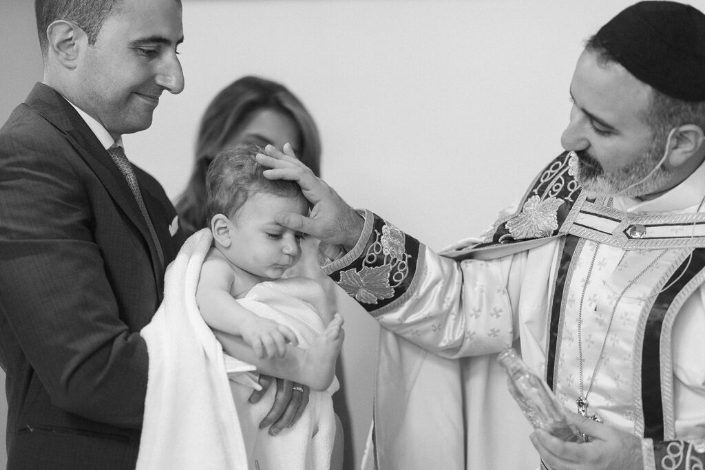 Candid family moments during baptism at Sts. Peter and Paul Syriac Orthodox Church